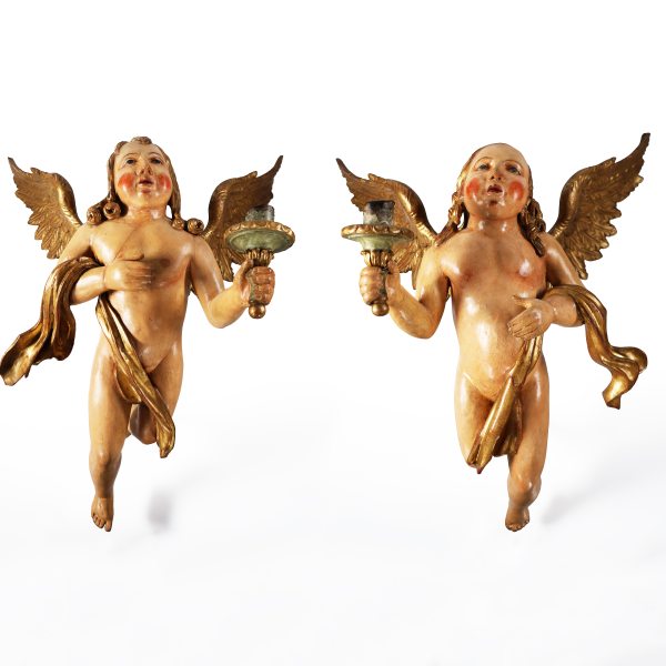 A pair of torch-bearing angels in carved and sculpted wood. Italy, late 17th, early 18th century