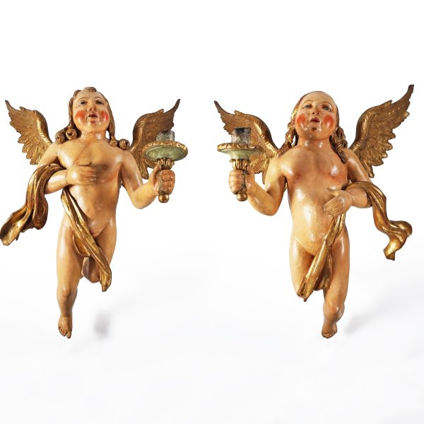 A pair of torch-bearing angels in carved and sculpted wood. Italy, late 17th, early 18th century