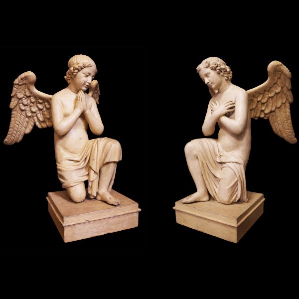 A pair of of archangels in carved and lacquered wood, Italy, 18th century