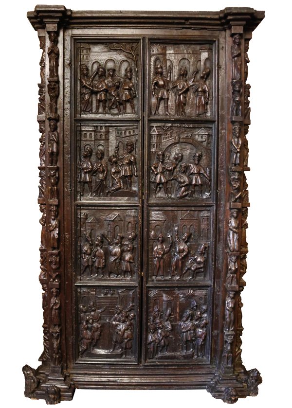 A wardrobe with relief-decorated doors and carved side uprights. Late 16th, early 17th century