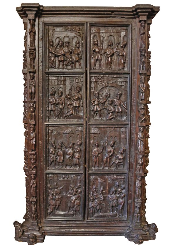 A wardrobe with relief-decorated doors and carved side uprights. Late 16th, early 17th century