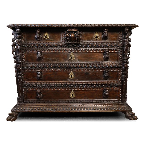 An Italian carved walnut chest of drawers "a bambocci", Genoese. Late 16th, early 17th century