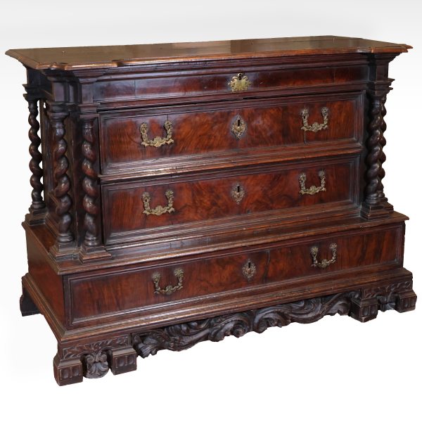 A Papal States walnut chest of drawers with hinged top, twist columns, second half 16th century