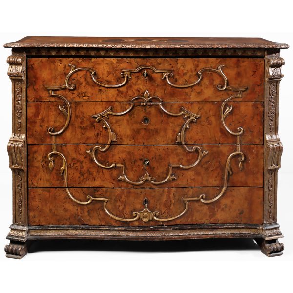 An Italian walnut burr veneered chest of drawers, carved pilasters, Lombardy, 18th century
