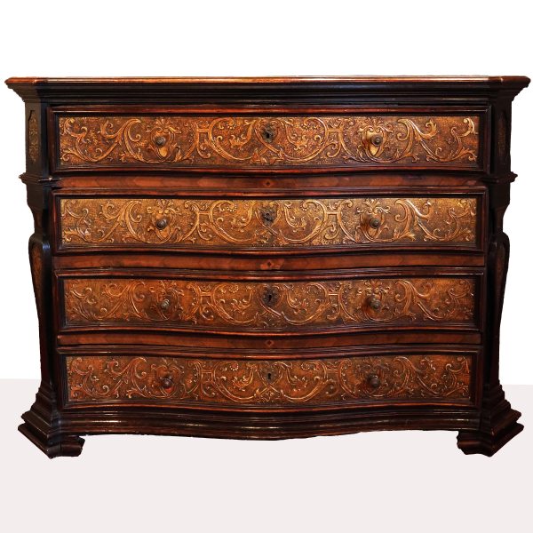 A North Italian walnut and gilded pastiglia chest of drawers, Milan, 17th century