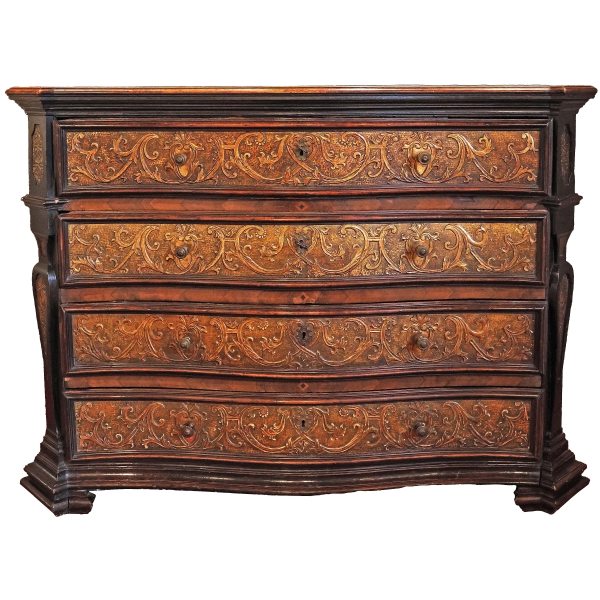 A North Italian walnut wood chest of drawers with gilt pastiglia decoration, Milan, 17th century