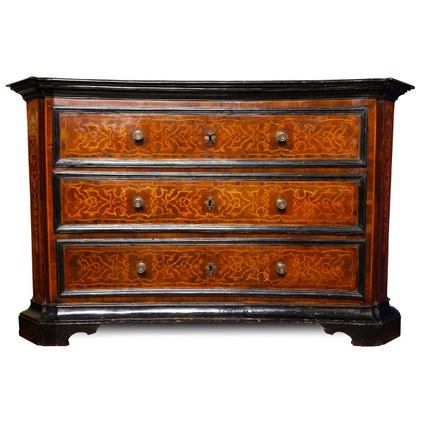 A North Italian inlaid chest of drawers. Emilia, late 17th early 18th century