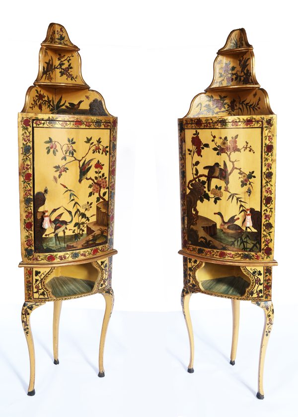 A North Italian pair of corner cabinets in lacquered wood, Piedmont, mid-18th century