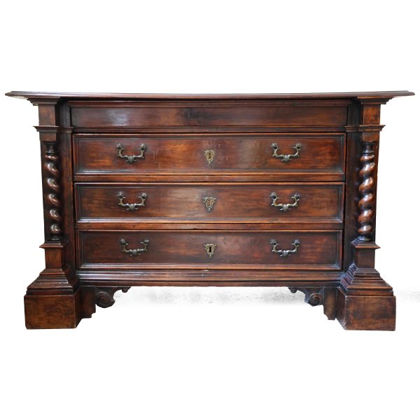 An Italian walnut wood chest of drawers with three drawers and a secretaire. Bologna, 17th century