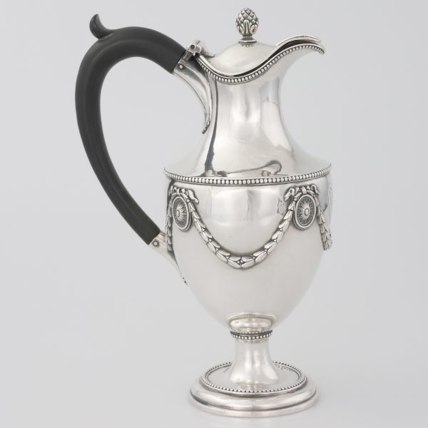 A George II sterling silver chocolate pot, Sebastian & James Crespell, London, 1774