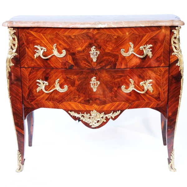 A French veneered in bois de rose commode, stamped Christophe Wolff, Paris, mid-18th century