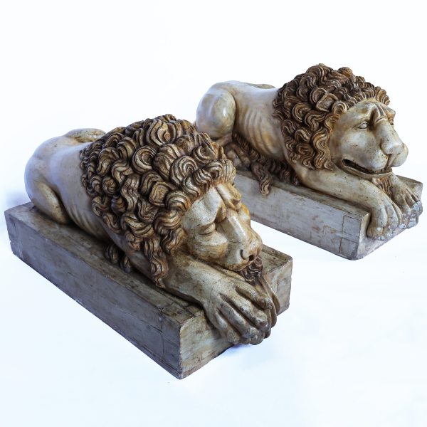 A North Italian pair of carved and lacquered wood lions, Venice, late 18th century