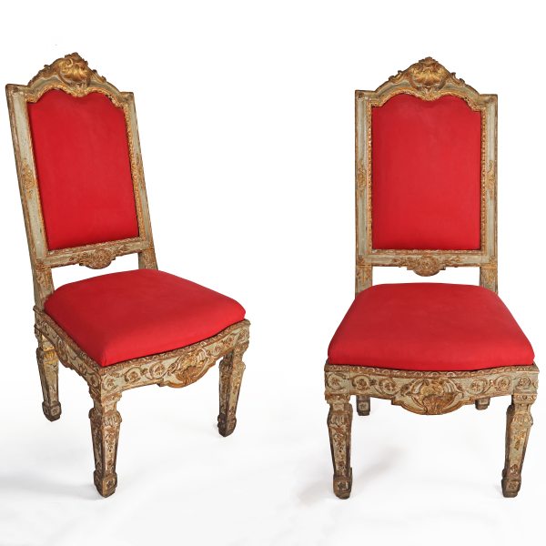 An Italian pair of armchairs in carved and lacquered. Francesco Bolgi&egrave;?, Turin, 18th century