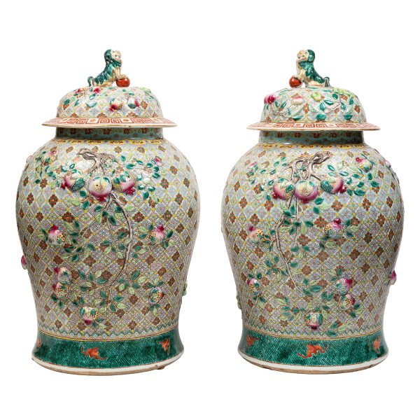 A pair of porcelain vases with moulded decoration. China, Qing Dynasty 1644-1911, 19th century
