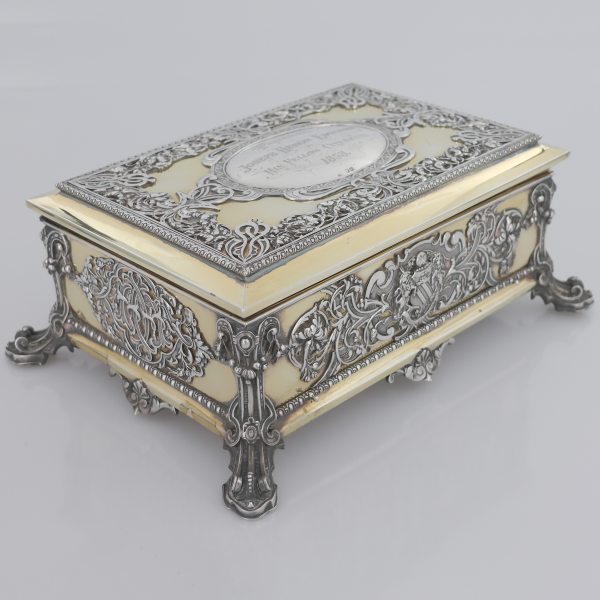 A Victorian silver parcel gilt rectangular stationery casket, John Samuel Hunt, London, 1858