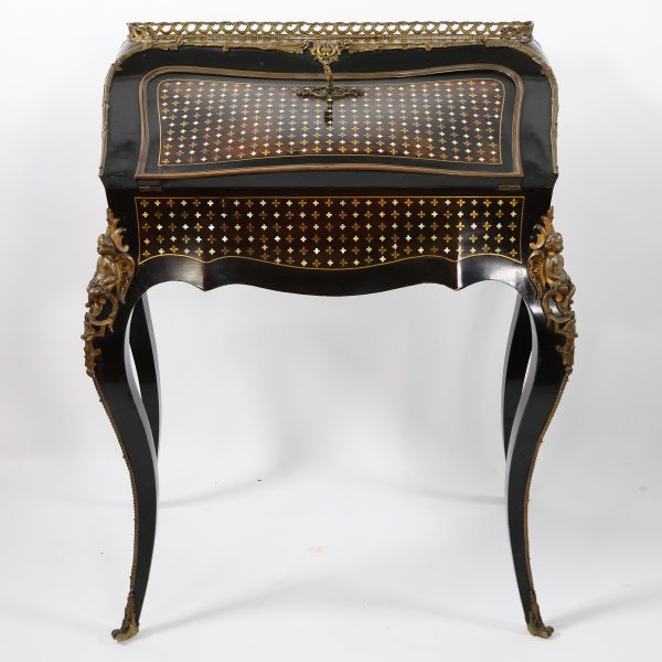 A French ebonized wood drop-front desk, inlaid with gilt copper and mother-of-pearl, 19th century