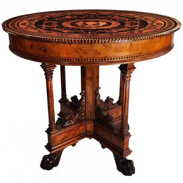 An Italian elm burl table, inlaid with ebony and fine woods. Tuscany, second half 19th century