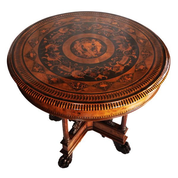 An Italian elm burl table, inlaid with ebony and fine woods. Tuscany, second half 19th century