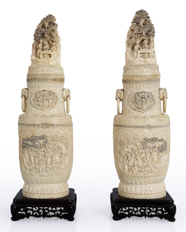 A pair of carved and sculpted ivory vases, China, Qing Dynasty, 1644&ndash;1911, early 20th century