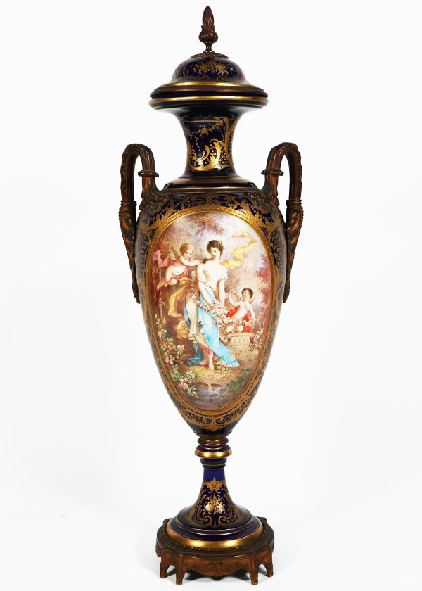 A French vase in the S&egrave;vres style, gilt-bronze mounted. Painted signed Poitevin. Late 19th century