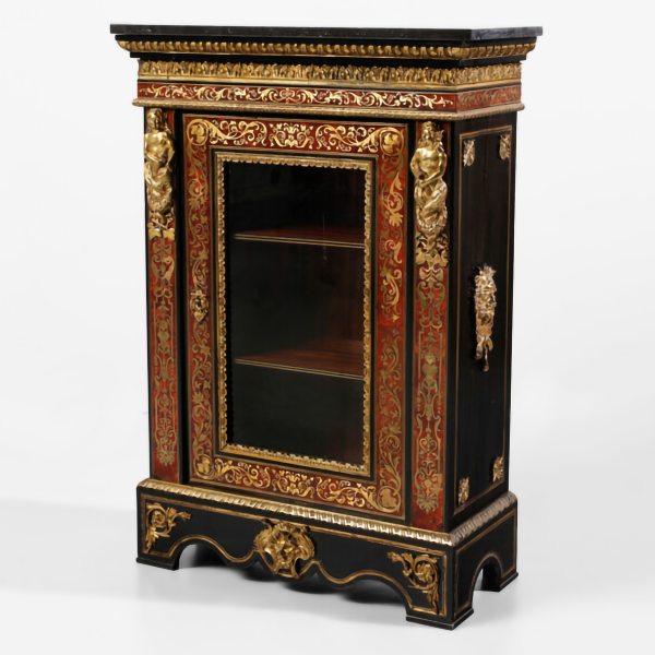 A French ebonized wood display cabinet, decorated in the manner of Boulle. 19th century
