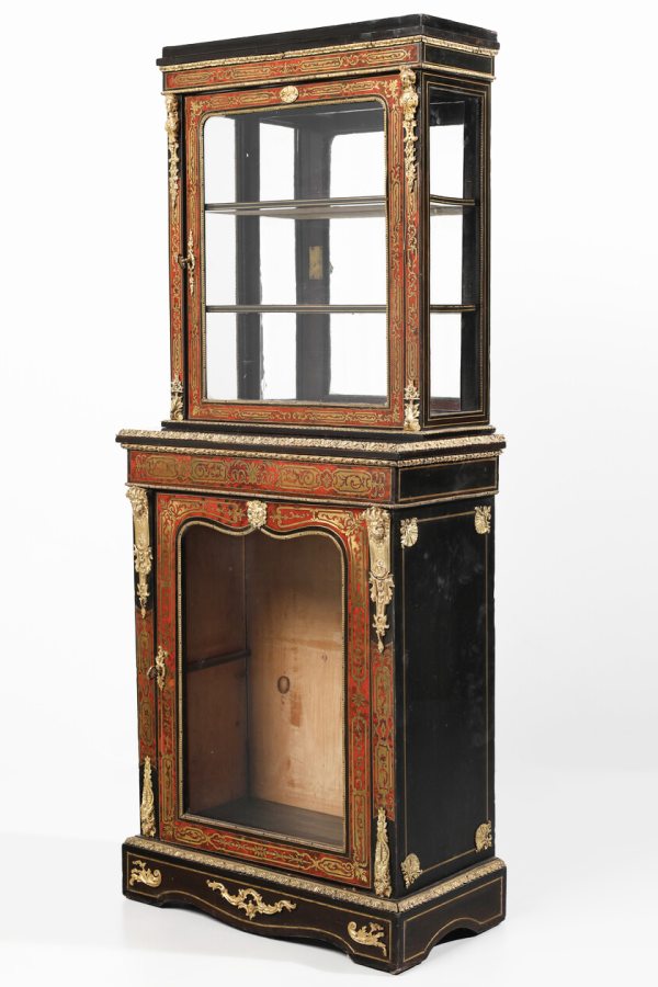 An ebonized wood display cabinet, decorated in the manner of Boulle, France, 19th century