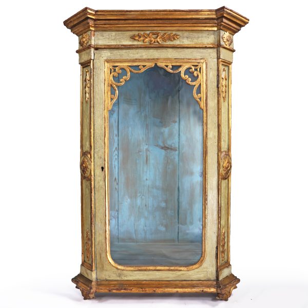 An Italian wooden display cabinet lacquered in green and gold. 19th century