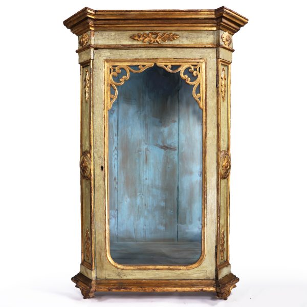 An Italian wooden display cabinet lacquered in green and gold. 19th century