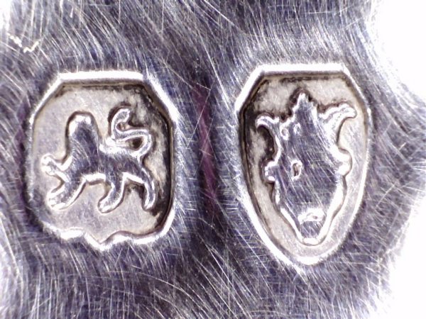 The Lion Passant. Leopard’s Head Crowned.